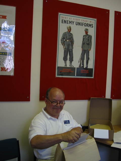 Ken looking over 398th memorabilia